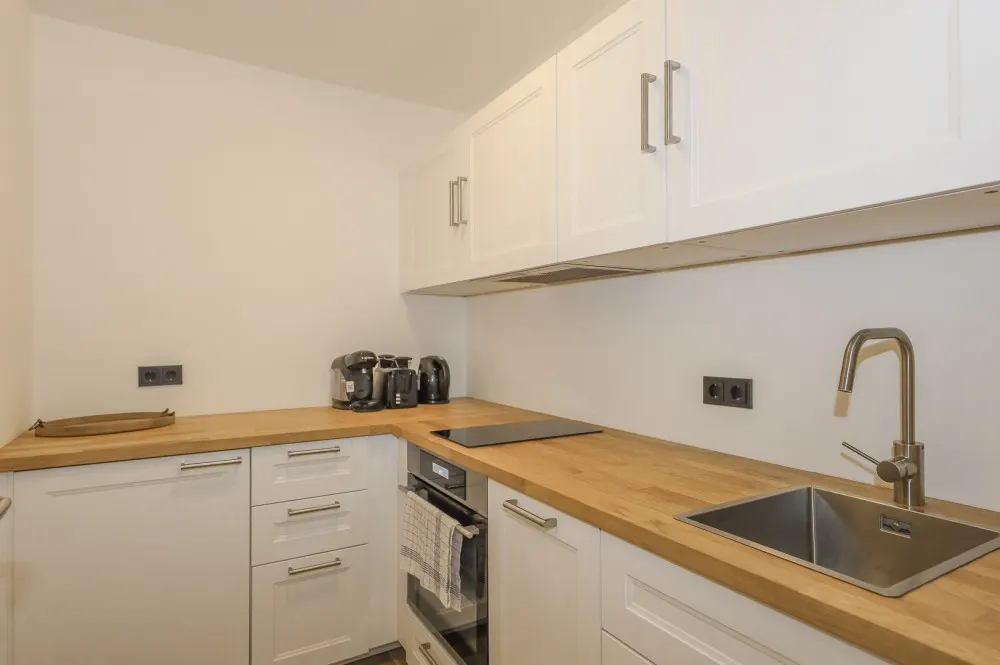 KITZIMMO-Garten Apartment mit touristischer Widmung kaufen - Immobilien Kitzbühel.