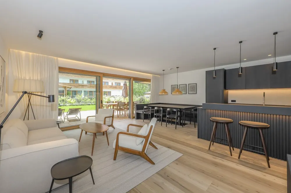 KITZIMMO-Riverside - Luxus-Garden-Suite in Toplage kaufen - Immobilien Kirchberg.
