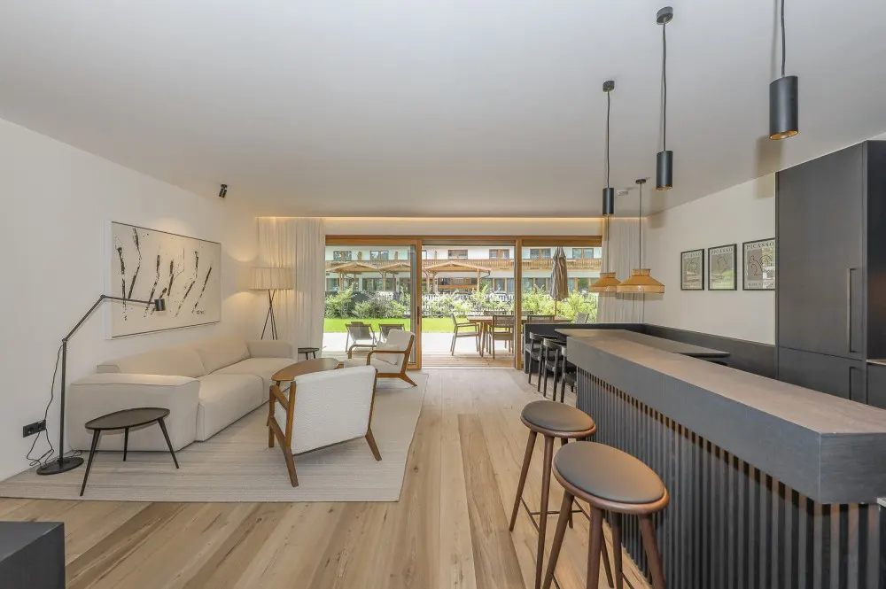 KITZIMMO-Riverside - Luxus-Garden-Suite in Toplage kaufen - Immobilien Kirchberg.