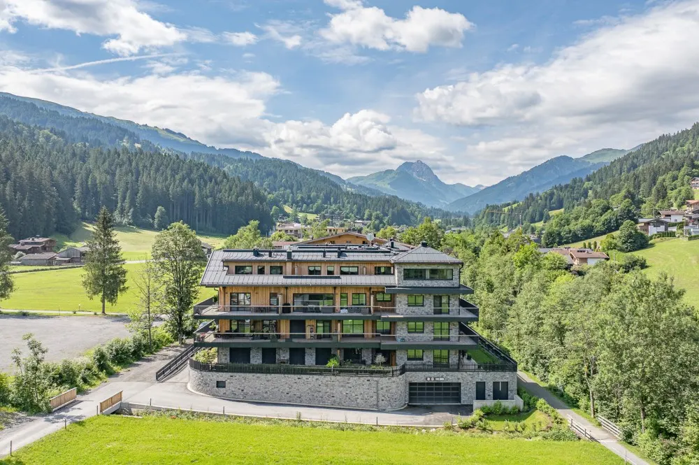 KITZIMMO-Riverside - Luxus-Garden-Suite in Toplage kaufen - Immobilien Kirchberg.