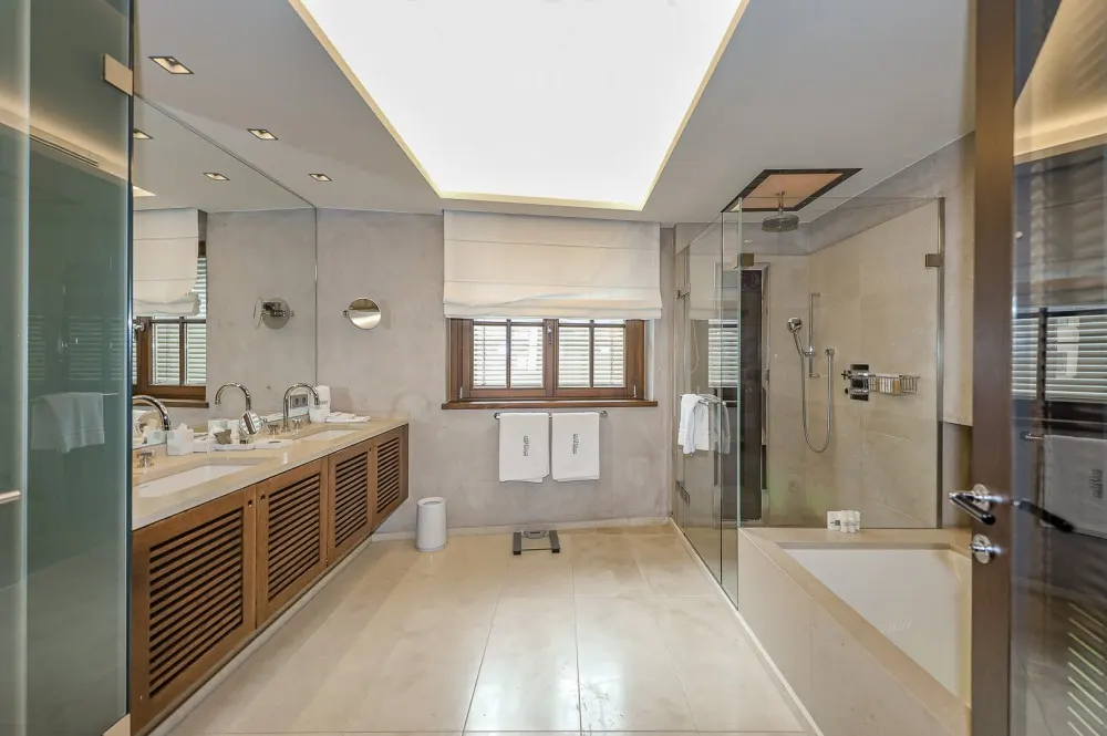 KITZIMMO-Luxus-Suite mit Zugang in ein 5-Sterne-Hotel - Immobilien Kitzbühel.
