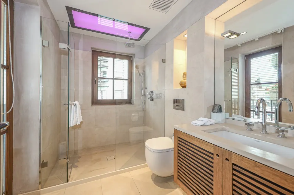 KITZIMMO-Luxus-Suite mit Zugang in ein 5-Sterne-Hotel - Immobilien Kitzbühel.