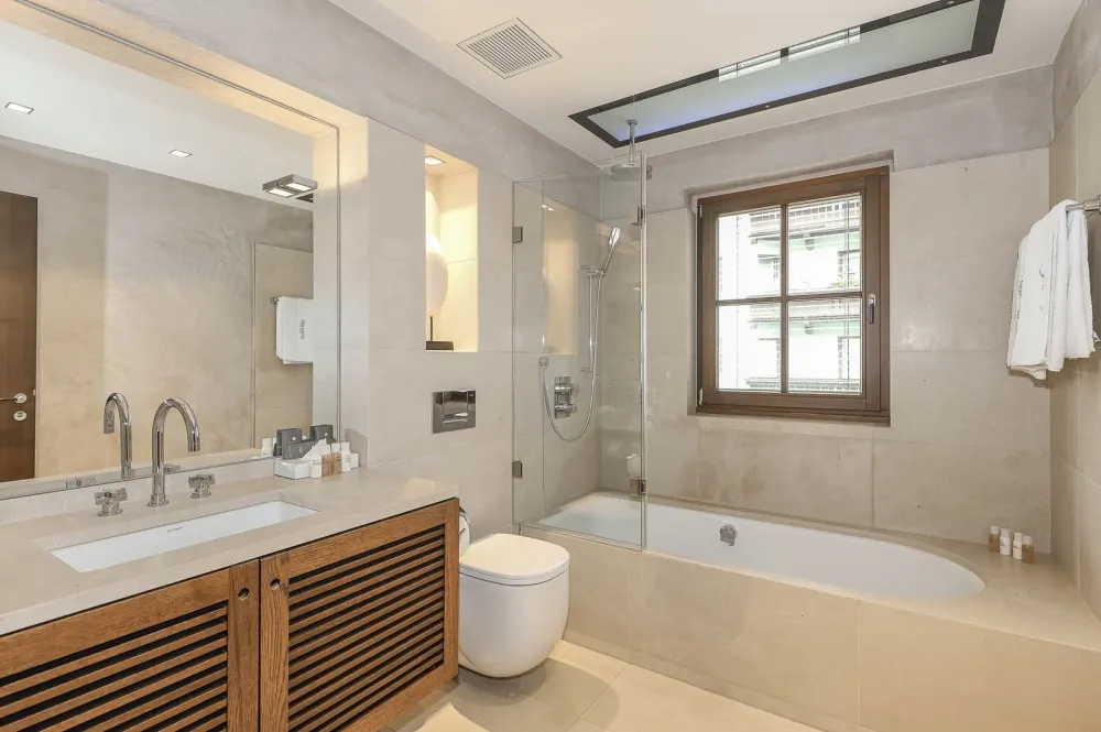 KITZIMMO-Luxus-Suite mit Zugang in ein 5-Sterne-Hotel - Immobilien Kitzbühel.