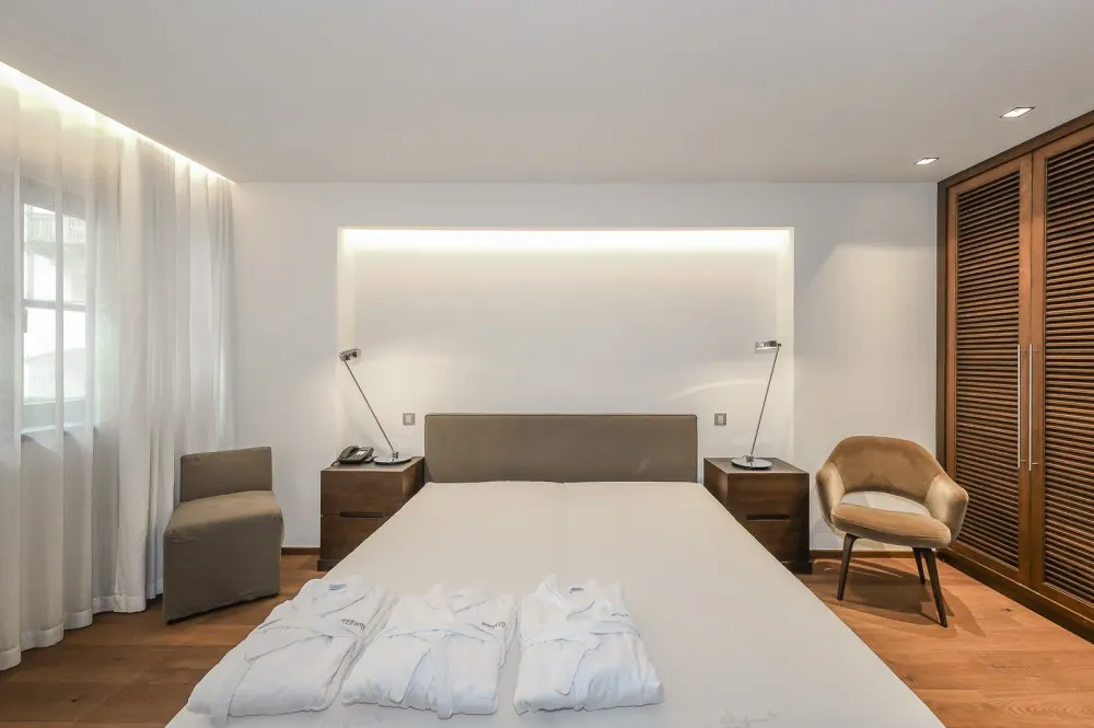 KITZIMMO-Luxus-Suite mit Zugang in ein 5-Sterne-Hotel - Immobilien Kitzbühel.
