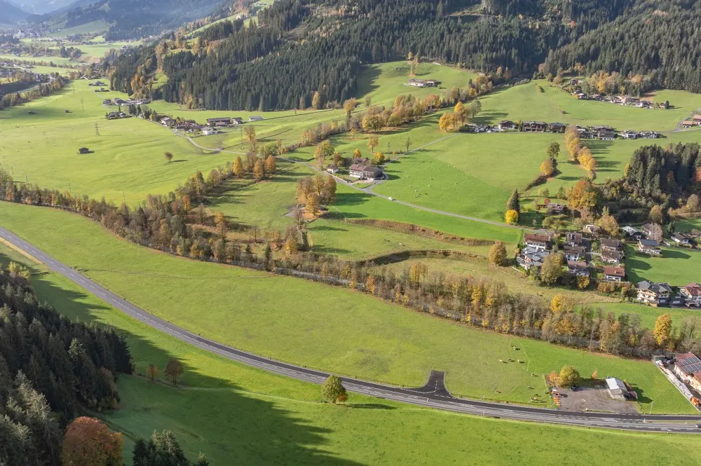 KITZIMMO-Gewerbegrundstück in Toplage kaufen - Immobilien Aurach bei Kitzbühel.
