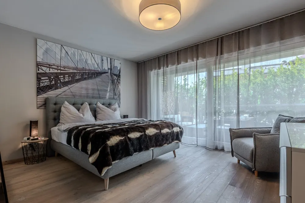 KITZIMMO-Hochwertige Haushälfte am Golfplatz kaufen - Immobilien Kitzbühel.