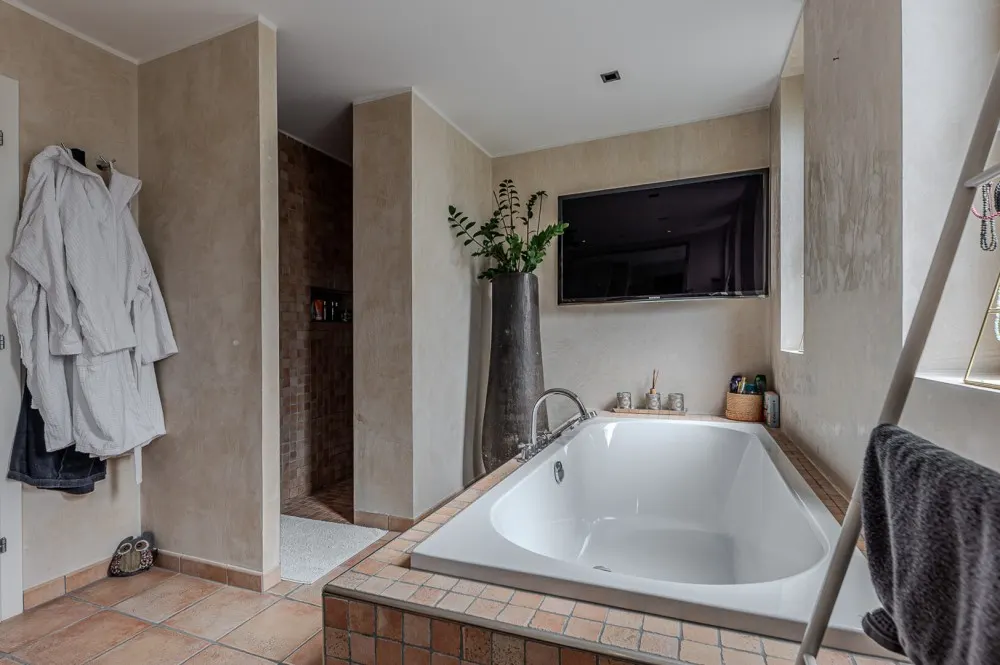 KITZIMMO-Hochwertige Haushälfte am Golfplatz kaufen - Immobilien Kitzbühel.