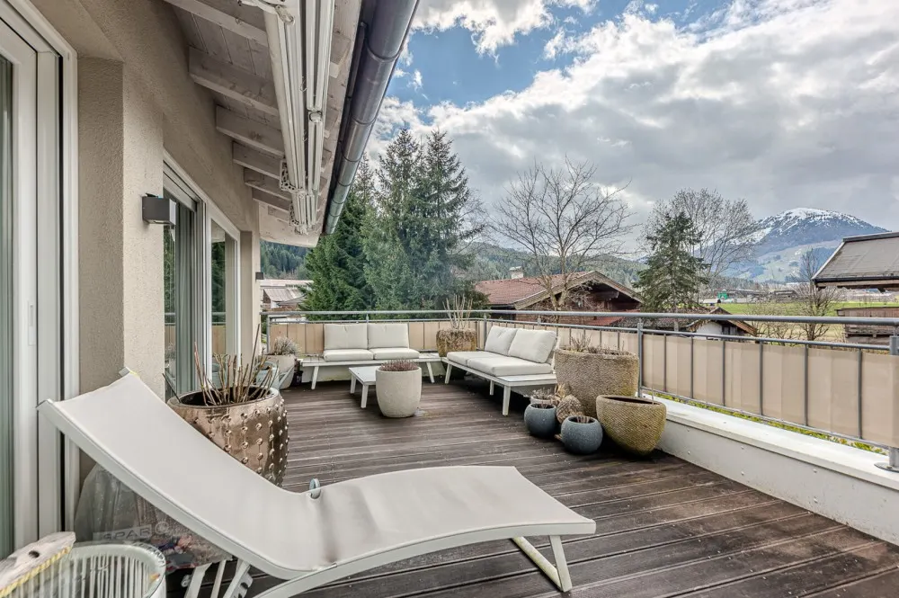 KITZIMMO-Hochwertige Haushälfte am Golfplatz kaufen - Immobilien Kitzbühel.