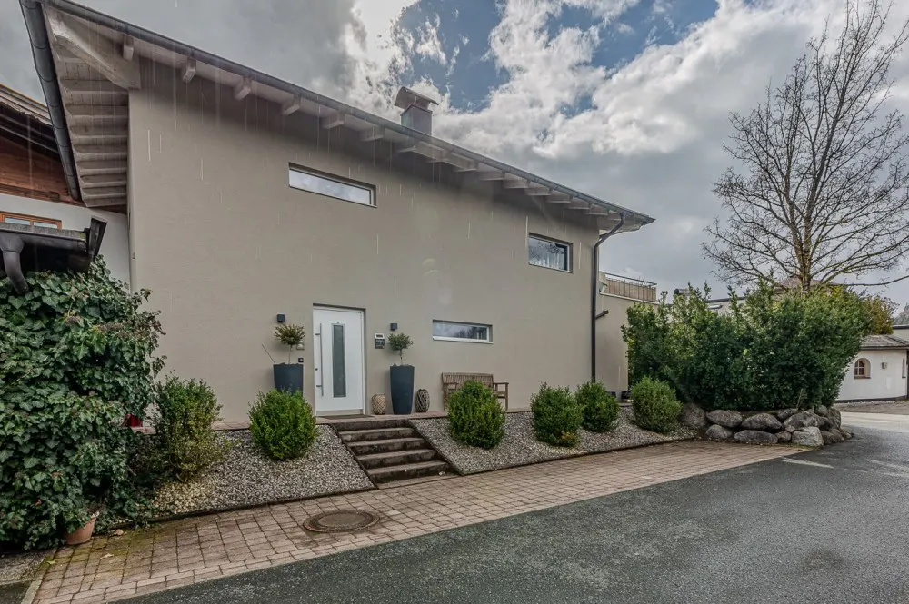 KITZIMMO-Hochwertige Haushälfte am Golfplatz kaufen - Immobilien Kitzbühel.