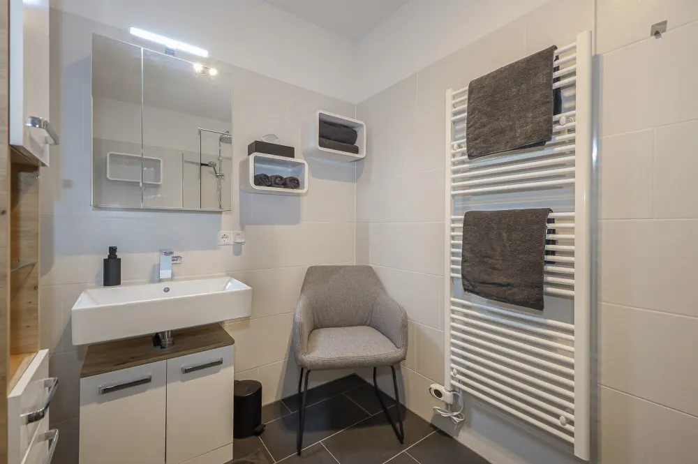 KITZIMMO-exklusive Neubauwohnung mit Hahnenkammblick - Immobilien Kitzbühel.-12