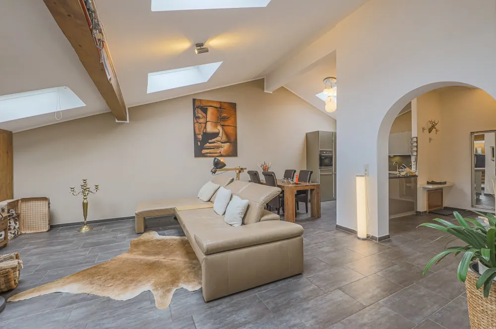 KITZIMMO-exklusive Dachgeschosswohnung kaufen - Immobilien Kitzbühel.