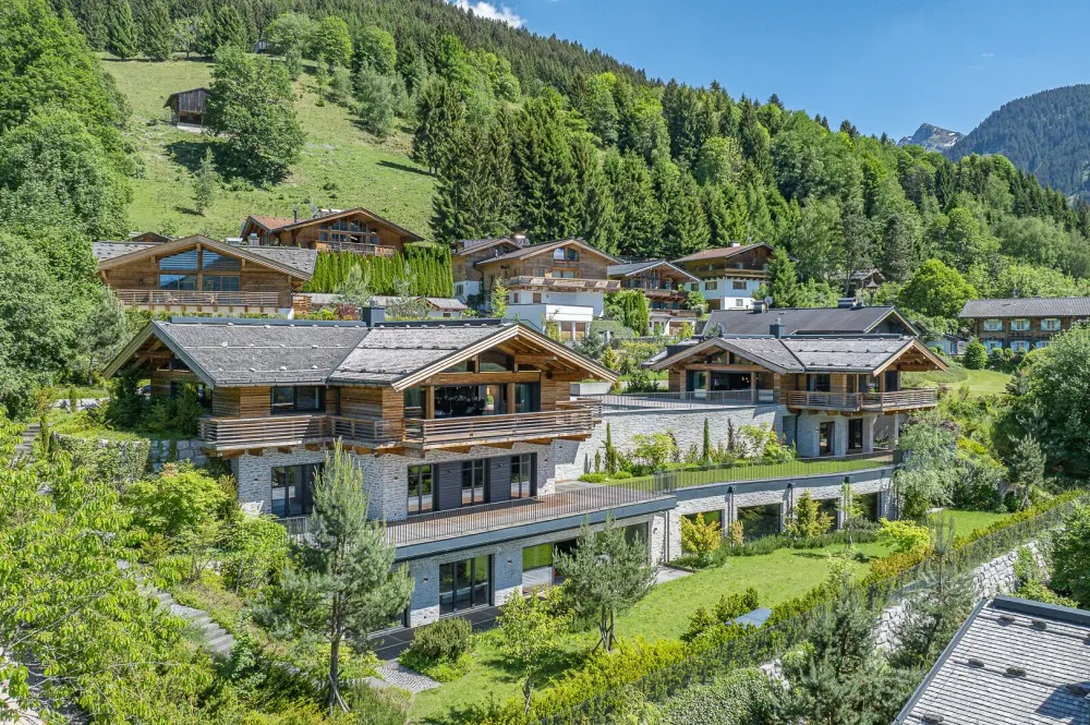 KITZIMMO-Einzigartige Luxusvilla mit Gästehaus in prominenter Toplage - Immobilien Aurach.
