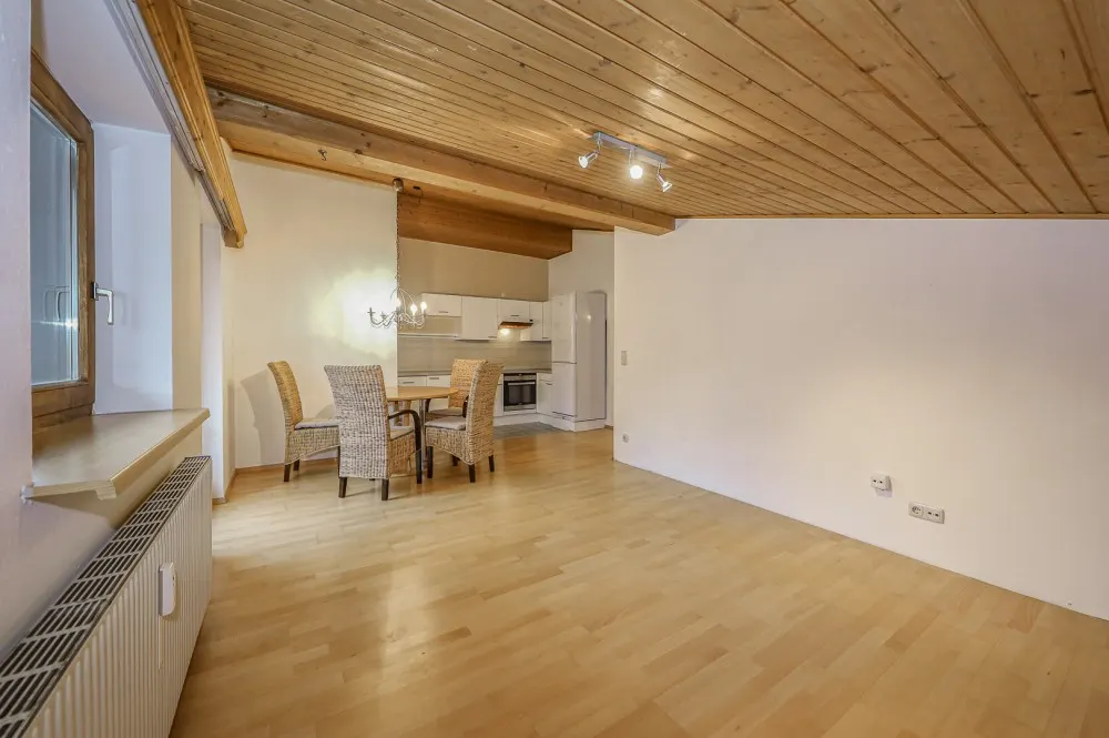 KITZIMMO-Dachgeschosswohnung mit Bergblick kaufen - Immobilien Kitzbühel.