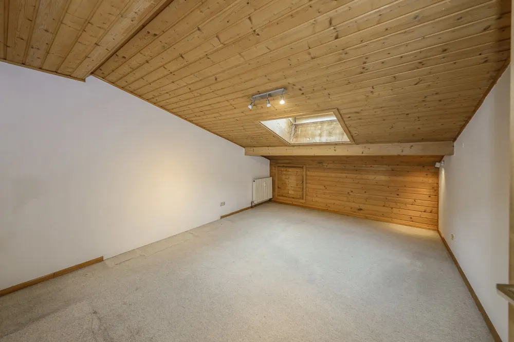KITZIMMO-Dachgeschosswohnung mit Bergblick kaufen - Immobilien Kitzbühel.