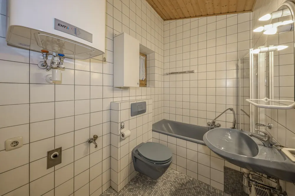 KITZIMMO-Dachgeschosswohnung mit Bergblick kaufen - Immobilien Kitzbühel.