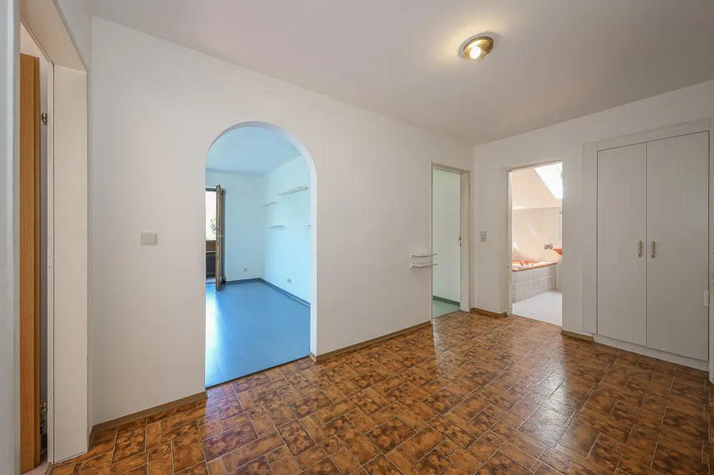 KITZIMMO-Dachgeschosswohnung in Ruhelage mit Kaiserblick kaufen - Immobilien Oberndorf.