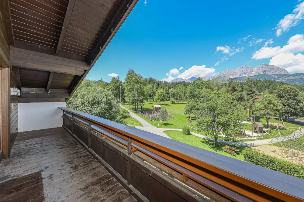 KITZIMMO-Dachgeschosswohnung in Ruhelage mit Kaiserblick kaufen - Immobilien Oberndorf.
