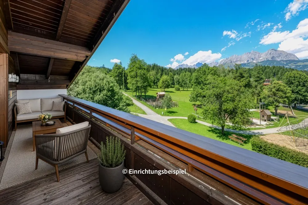 KITZIMMO-Dachgeschosswohnung in Ruhelage mit Kaiserblick kaufen - Immobilien Oberndorf.