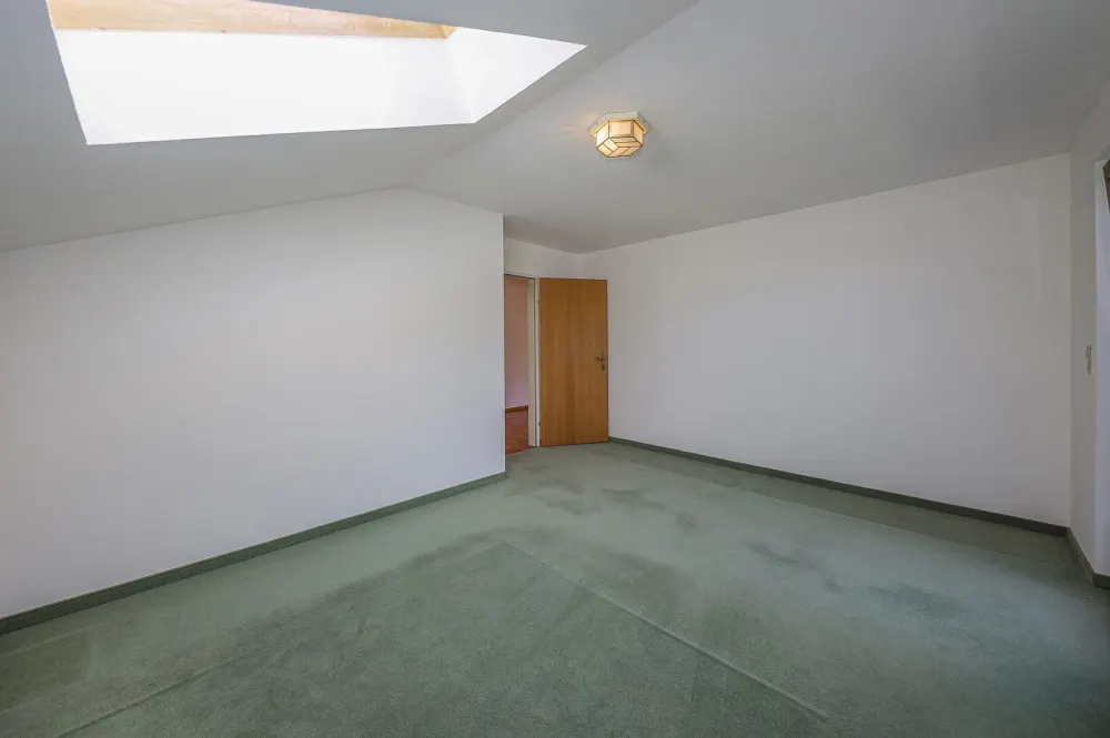 KITZIMMO-Dachgeschosswohnung in Ruhelage mit Kaiserblick kaufen - Immobilien Oberndorf.