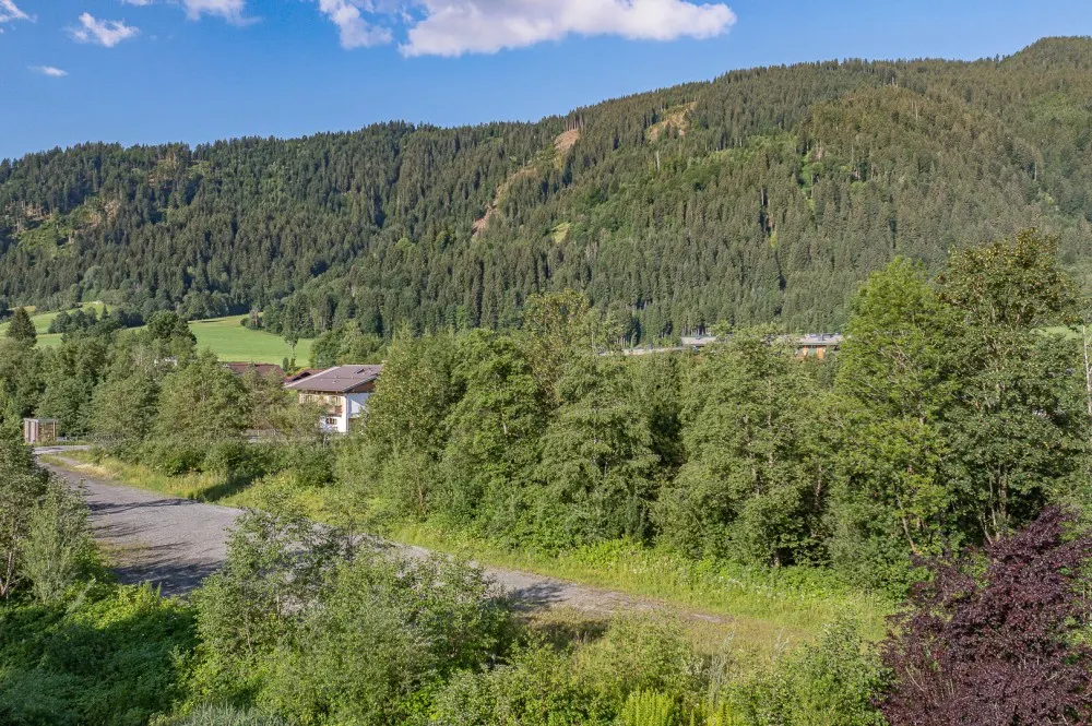 KITZIMMO-Grundstück mit Projektierung für ein Wohn- und Geschäftshaus - Immobilien Reith.