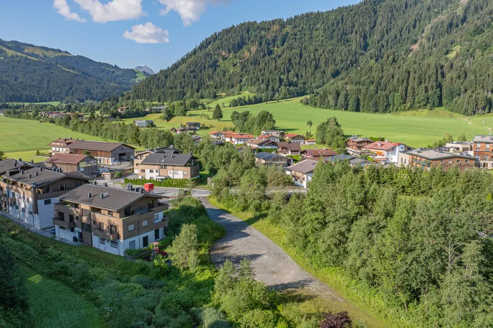 KITZIMMO-Grundstück mit Projektierung für ein Wohn- und Geschäftshaus - Immobilien Reith.