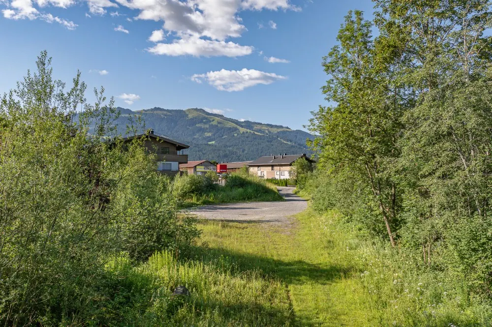 KITZIMMO-Grundstück mit Projektierung für ein Wohn- und Geschäftshaus - Immobilien Reith.