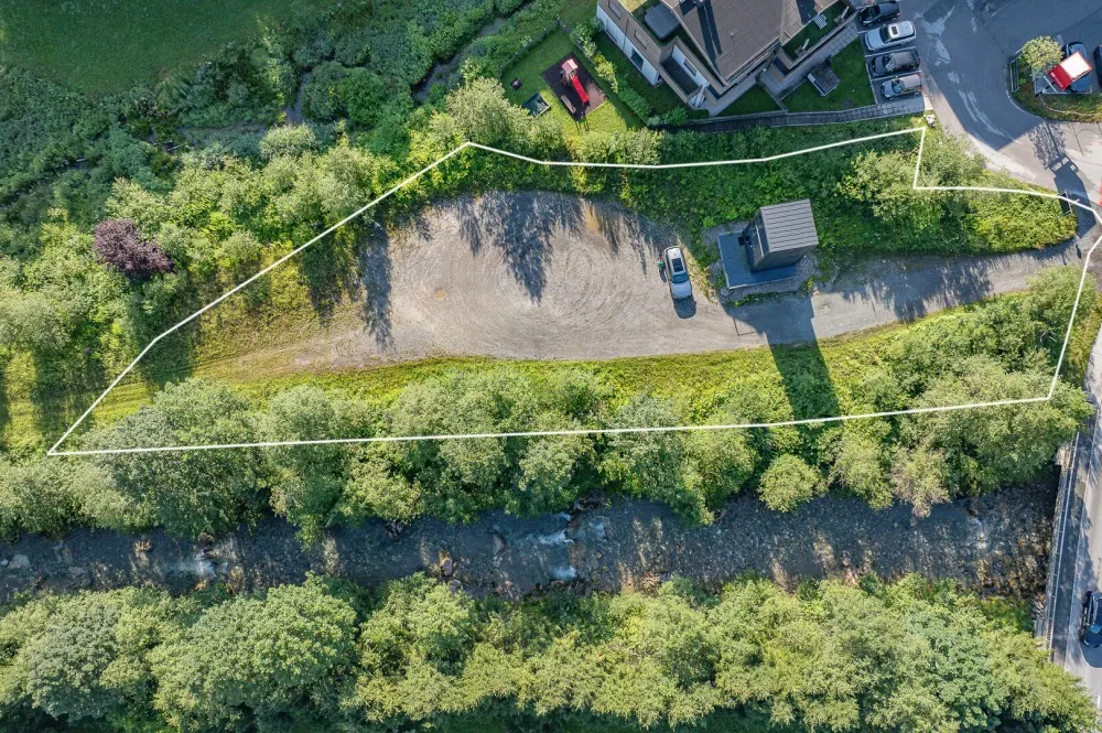 KITZIMMO-Grundstück mit Projektierung für ein Wohn- und Geschäftshaus - Immobilien Reith.