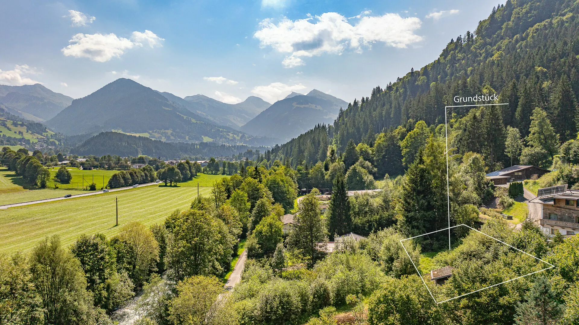 KITZIMMO-Grundstück für Einheimische in sonniger Ruhelage kaufen - Immobilien Kitzbühel.-1